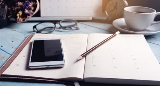 Image showing a phone on top of a diary